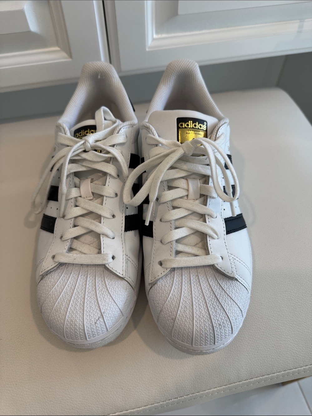 Adidas White Sneakers with Black Stripes & Gold Tongue Badge women’s 8.5